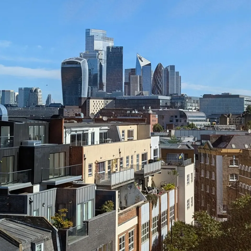Rooftop gardens in the foreground with the City of London towers behind