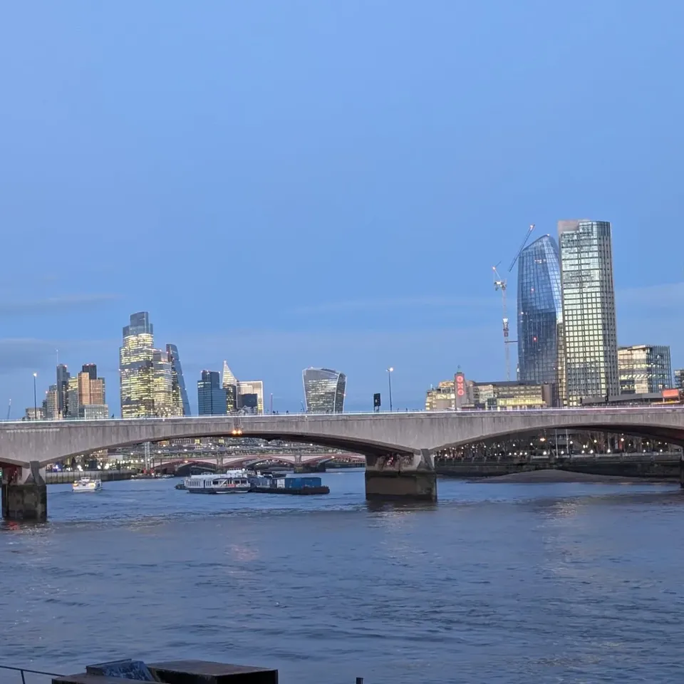 Waterloo Bridge and the City skyline at dusk
